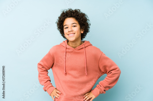 African american little boy isolated confident keeping hands on hips.