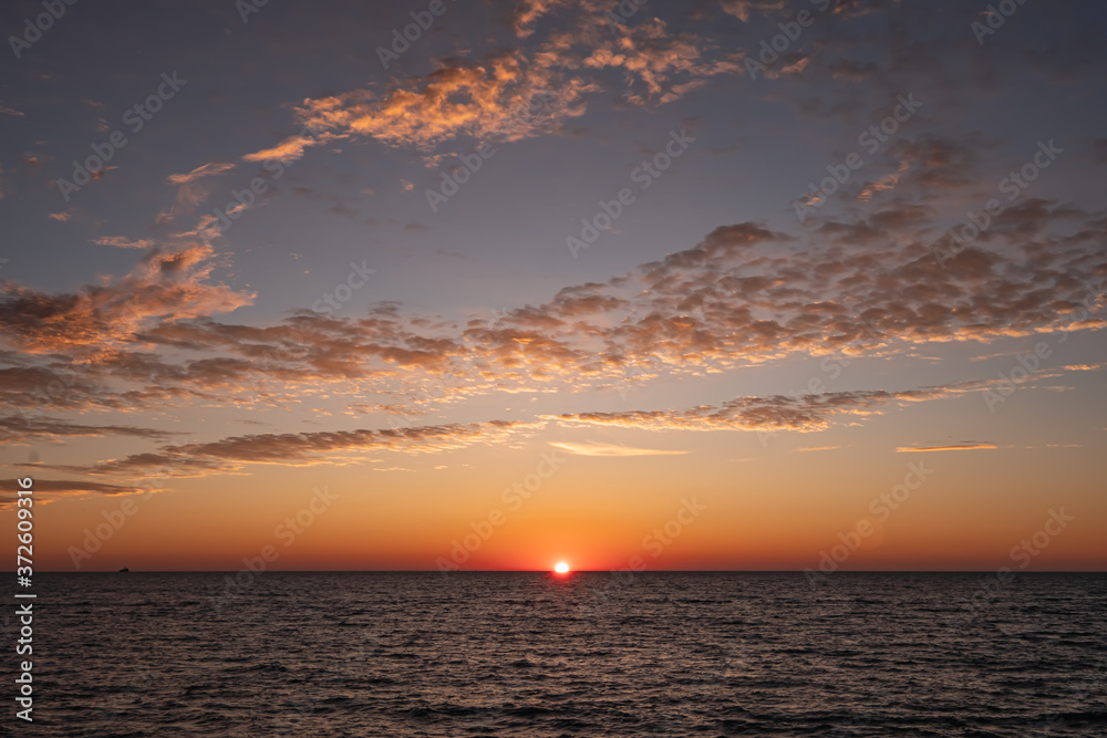 Sunrise on Lake Michigan horizon 