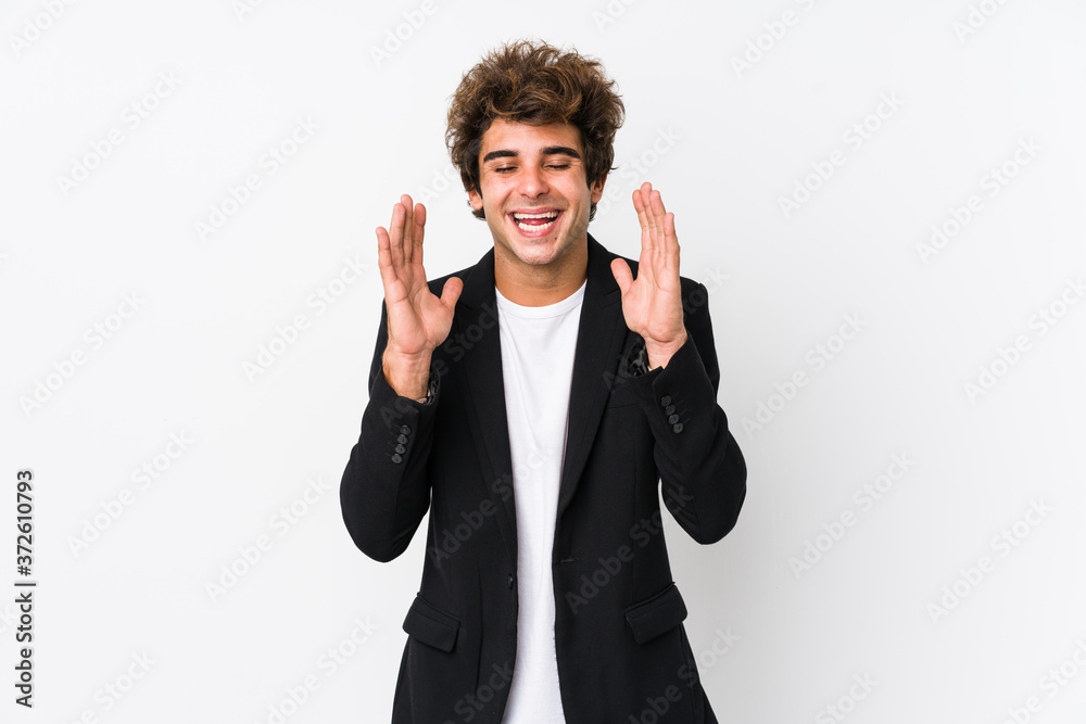 Young caucasian business man against a white background isolated joyful laughing a lot. Happiness concept. Young caucasian business man against a white background isolated joyful laughing a lot. Happiness concept.