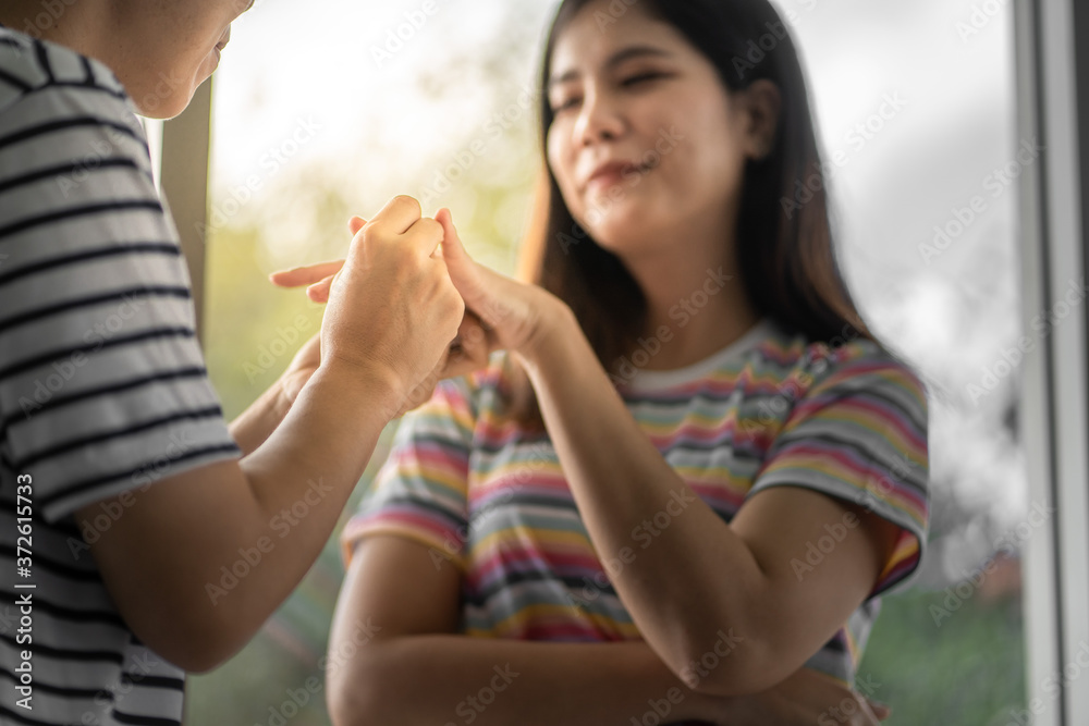 Lesbian couples are having fun together in the house.