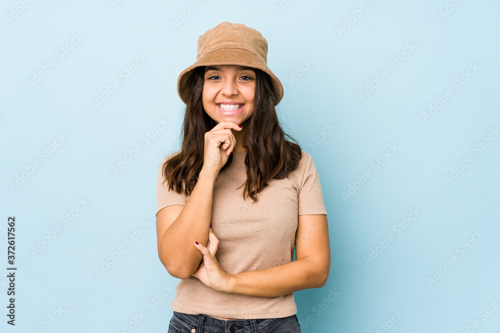 Young mixed race hispanic woman isolated smiling happy and confident, touching chin with hand. Young mixed race hispanic woman isolated smiling happy and confident, touching chin with hand.