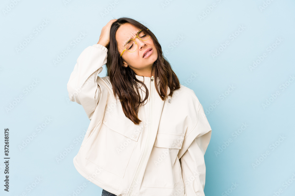 Young mixed race hispanic woman isolated tired and very sleepy keeping hand on head. Young mixed race hispanic woman isolated tired and very sleepy keeping hand on head.