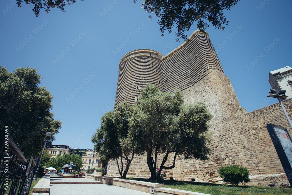 Baku, Azerbaijan - April 29, 2020: The Maiden Tower also known as Giz Galasi, located in the Old City in Baku. Tower was built in the 12th century.