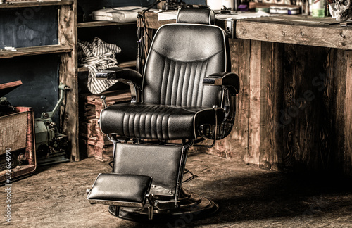Stylish vintage barber chair. Professional hairstylist in barbershop interior. Barbershop interior. Barber shop chair. Barbershop armchair, modern hairdresser and hair salon, barber shop for men