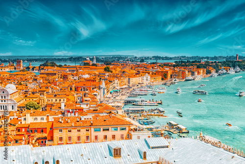 Panoramic view of Venice from the Campanile tower of St. Mark's Cathedral (Campanile di San Marco)- seafront promenade near St. Mark's Square. Italy. photo