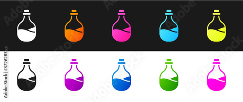 Set Old bottle of wine icon isolated on black and white background. Vector.