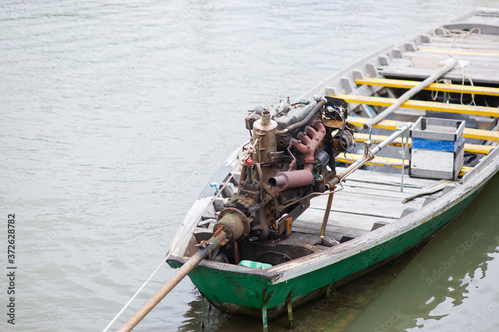 Obraz premium Old but still working long tail boat engines for fishermen.