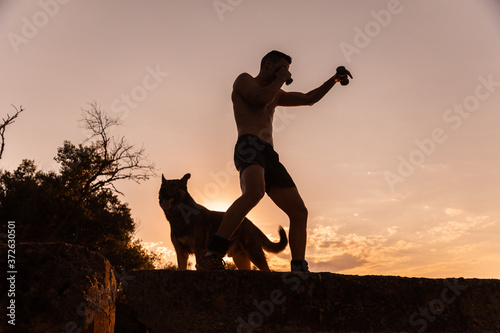 man training with his dog