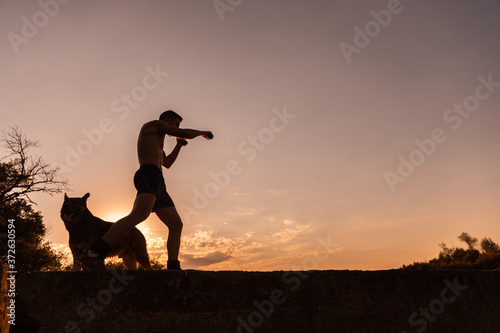man training with his dog