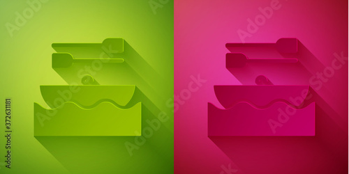 Paper cut Boat with oars icon isolated on green and pink background. Water sports, extreme sports, holiday, vacation, team building. Paper art style. Vector.