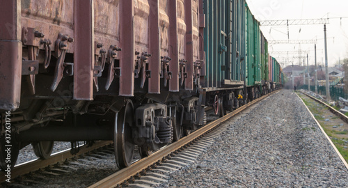 freight train moves during sunset.