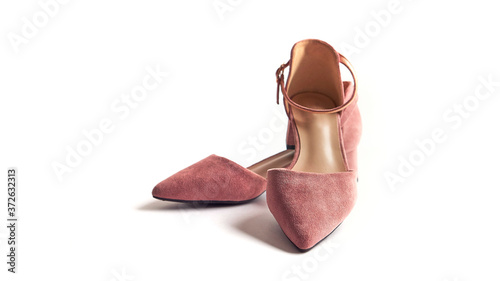 beige mules on a white background, female shoes. front view photo