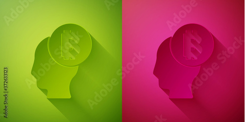 Paper cut Bitcoin think icon isolated on green and pink background. Cryptocurrency head. Blockchain technology, digital money market, cryptocoin wallet. Paper art style. Vector.