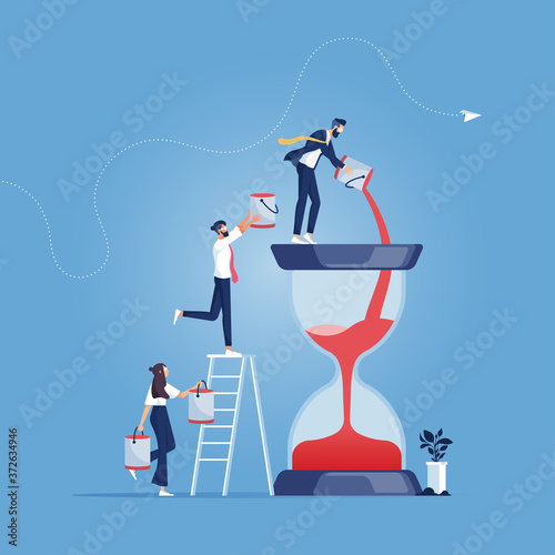 Time management concept-Business team pouring additional time sand into the Hourglass, Business team pouring additional time sand into the Hourglass-Time management concept