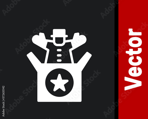 White Jack in the box toy icon isolated on black background. Jester out of the box. Vector.