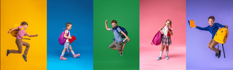 Back to school! Collage 5 school children on a colorful paper wall background.