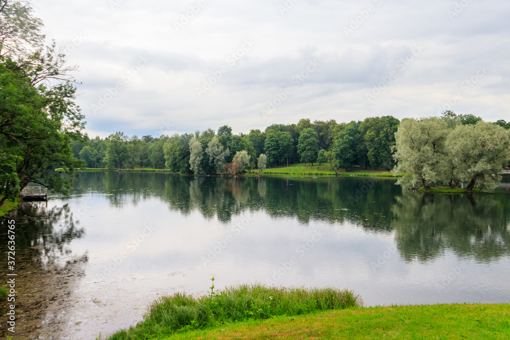 View of a lake during a rain in Gatchina park, Russia