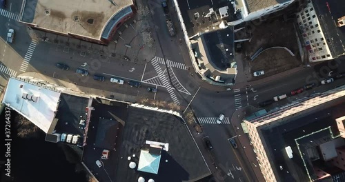 Wallpaper Mural drone shot moving across streets in the city while cars are driving Torontodigital.ca