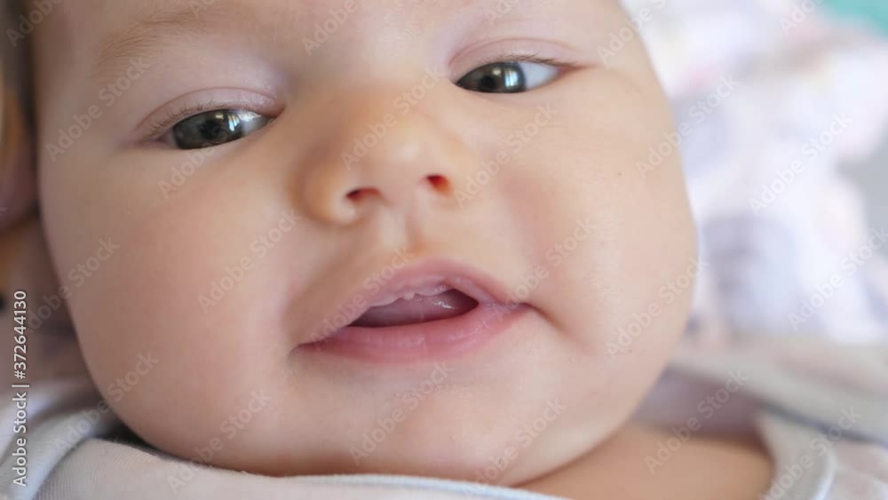 cute little baby infant newborn toddler portrait smiling to camera looking cute little baby infant newborn toddler portrait smiling to camera looking