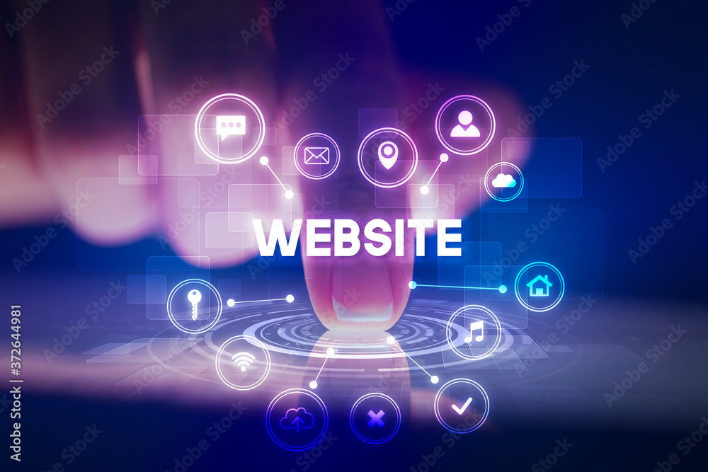 Finger touching tablet with web technology icons and WEBSITE inscription, web technology concept Finger touching tablet with web technology icons and WEBSITE inscription, web technology concept