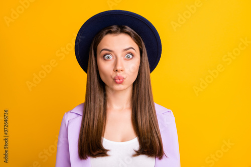 Close-up portrait of her she nice-looking attractive pretty lovely lovable winsome cheerful girlish teen girl sending you air kiss isolated on bright vivid shine vibrant yellow color background