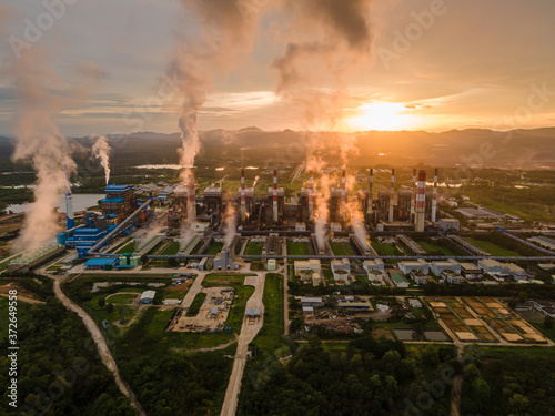 Coal power plant with steam pouring out of the stack, Mae Moh Power Plant, Lampang, Thailand photo