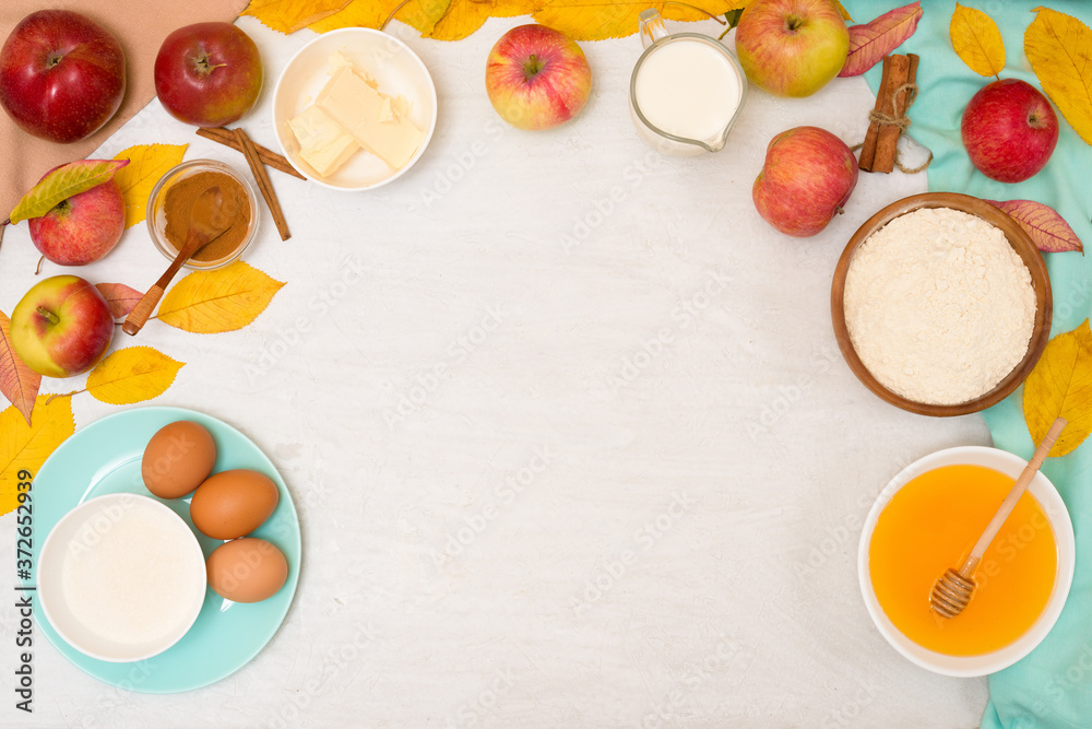 ingredients and recipe for homemade Apple cupcakes and muffins, top view light background, yellow leaves. autumn concept of baking and autumn harvest ingredients and recipe for homemade Apple cupcakes and muffins, top view light background, yellow leaves. autumn concept of baking and autumn harvest