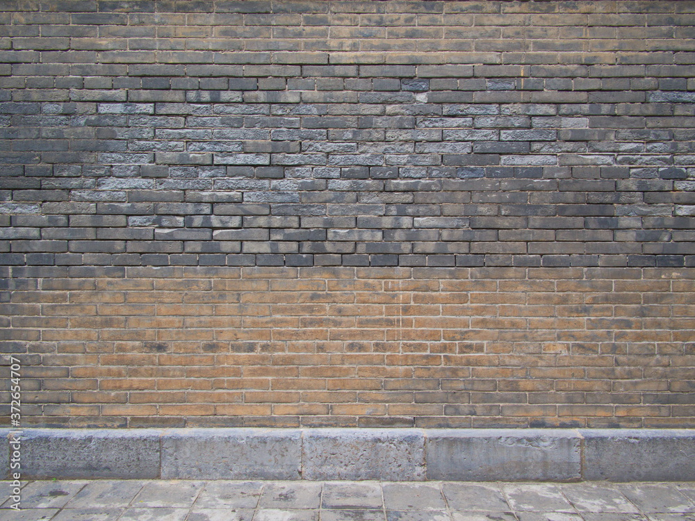 Obraz premium Ancient Brick Wall in Giant Wild Goose Pagoda. It was built in 652 during the Tang dynasty and originally had five stories. Xian City, Shaanxi Province, China. October 22nd, 2018.