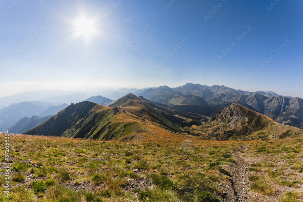 Views from the top of Mount Coriscao in León with views of the Picos de Europa of Asturias on a clear day with all the mountains in the background