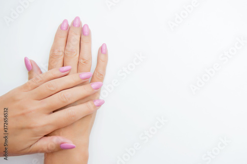 Women's hands isolated on a white background. Close up.
