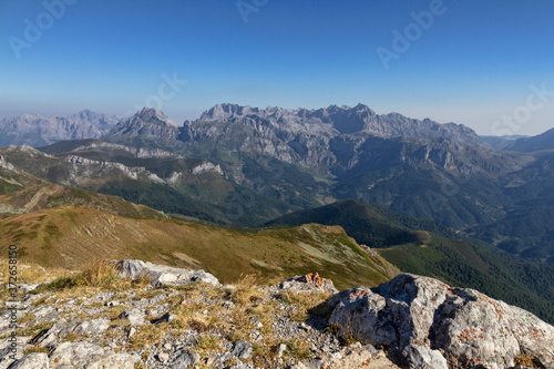 Top of Mount Coriscao in León with views of the Picos de Europa of Asturias on a clear day with all the mountains in the background
