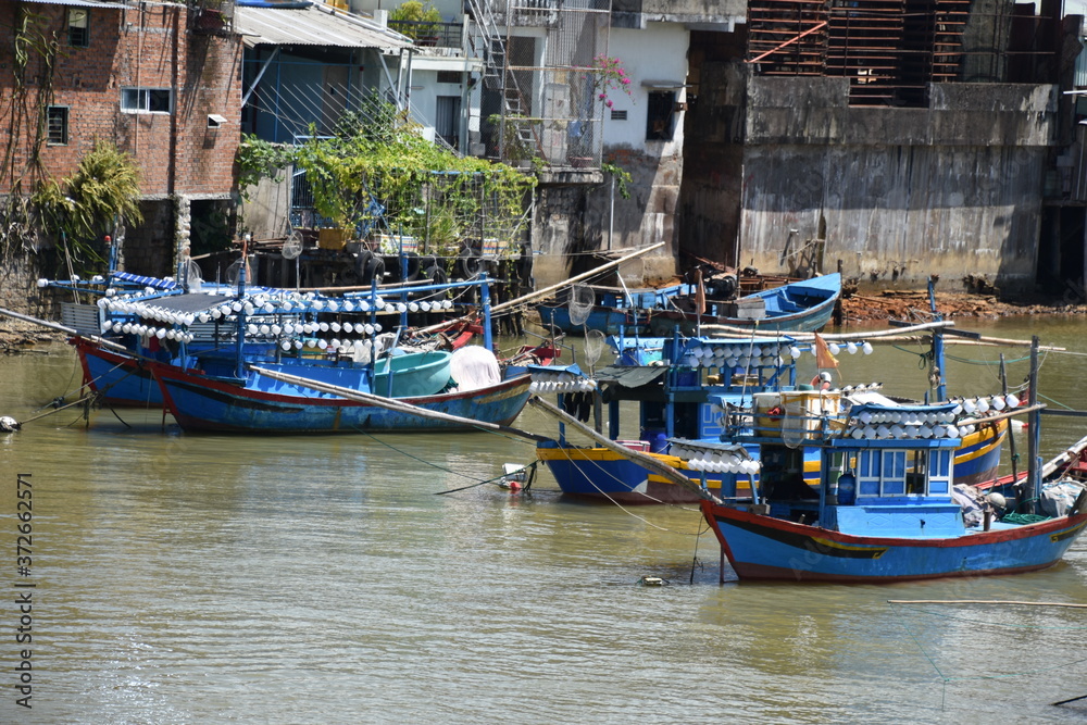 Fishing Boats with Riverside Shanties in Background, Nha Trang, Vietnam