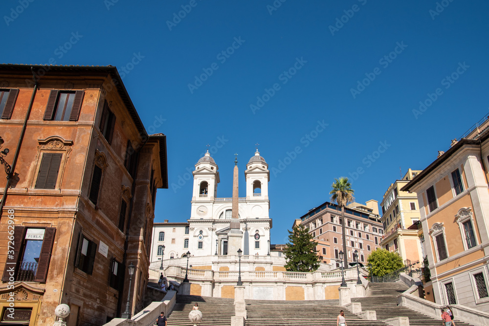 Trinità dei Monti Church on top of Spanish Steps in Rome Italy. With 138 steps in total the Spanish Steps of Rome are the longest and widest outdoor steps in Europe.