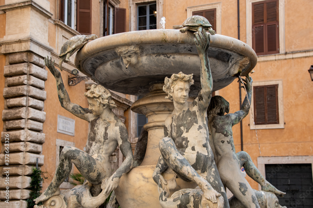The Fontana delle Tartarughe (The Turtle Fountain) is a fountain of the late Italian Renaissance, located in Piazza Mattei, Rome, Italy - obrazy, fototapety, plakaty 