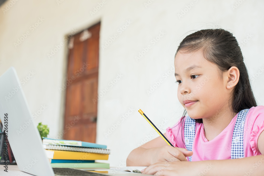 asian girl student online learning study online with video call teacher. social distance during quarantine, self-isolation, online education concept, homeschool, stay at home entertainment. asian girl student online learning study online with video call teacher. social distance during quarantine, self-isolation, online education concept, homeschool, stay at home entertainment.