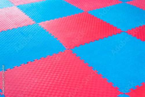 Photo background of blue and red tatami sport for martial arts. photo
