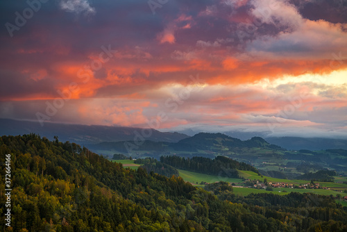 Bern during sunset with colorful sky and nice cloudscape. European mountain landscape, Switzerland, Bern.