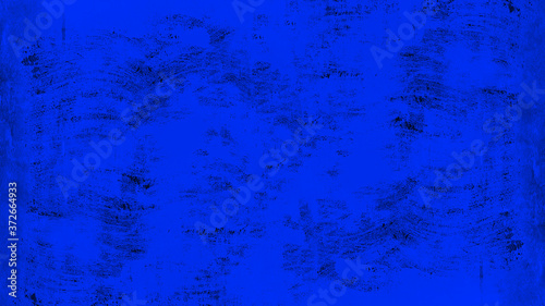Abstract dark phantom blue painted colored spotted scratched paper texture wallpaper background 