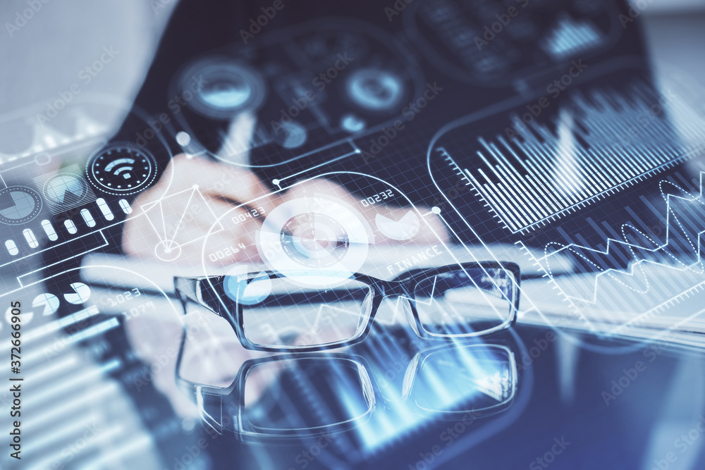 Tech theme hologram over woman's hands taking notes background. Concept of hightech. Double exposure Tech theme hologram over woman's hands taking notes background. Concept of hightech. Double exposure