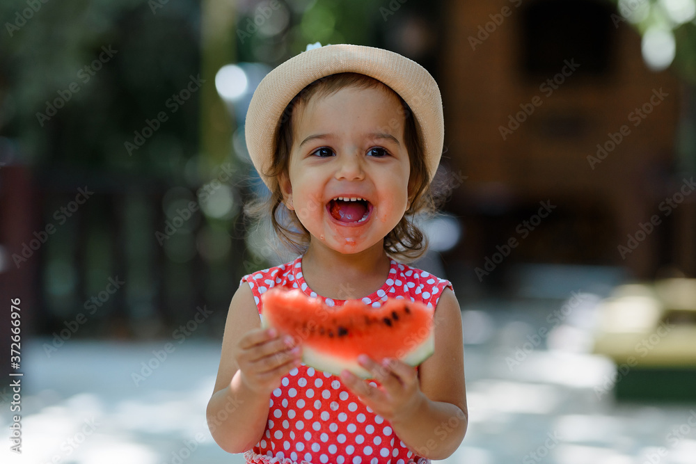 little-2-year-old-girl-kid-in-red-dress-with-white-polka-dots-and-hat