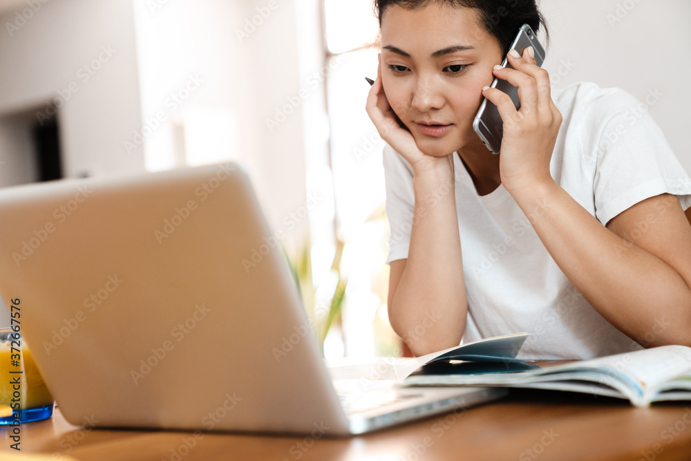 Beautiful young smart asian woman working Beautiful young smart asian woman working
