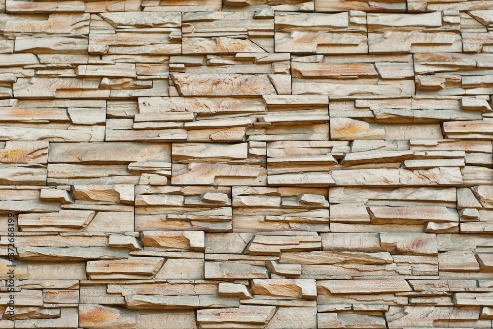 Texture of brick wall and concrete blocks. Samples of stone plates stacked evenly in a row. Texture of brick wall and concrete blocks. Samples of stone plates stacked evenly in a row.