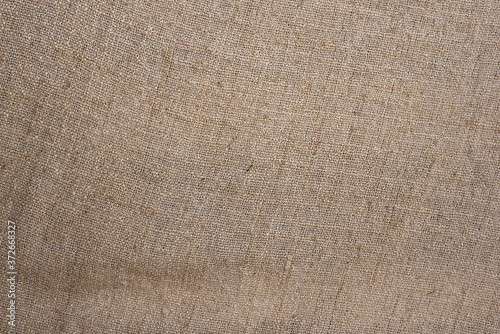 Brown sackcloth textured background.
