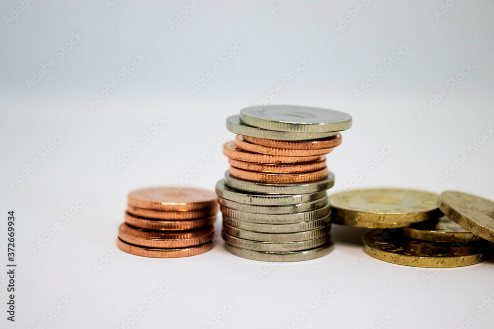 Stack of coins on a white background Stack of coins on a white background