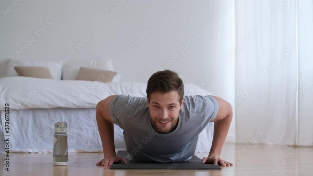 Family fitness at home, Father coach, Sports kid, Fun gymnastics. Man push up from the floor at home