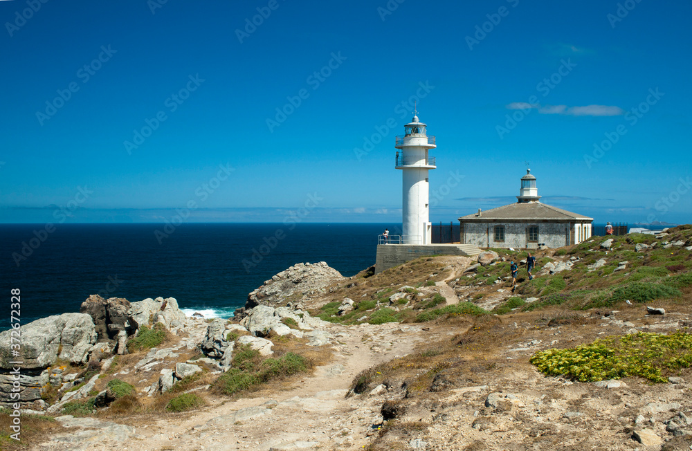 Sunny day in cape Touriñan lighthouse in La Coruña, Galicia