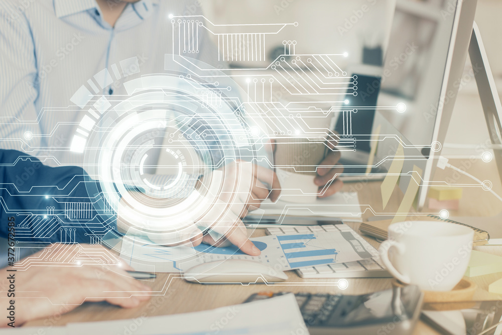 Double exposure of technology hologram with man working on computer background. Concept of big data. Double exposure of technology hologram with man working on computer background. Concept of big data.
