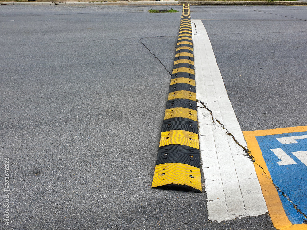 Artificial road roughness, made of rezipy, designed to limit the speed of cars.
