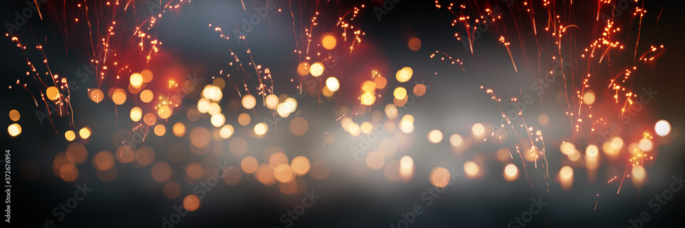 Celebrations with fireworks and bokeh
Celebrations with fireworks and bokeh. Horizontal background with blur effects and sparks for silvester and wedding. Special occasion concept with space for text - obrazy, fototapety, plakaty 