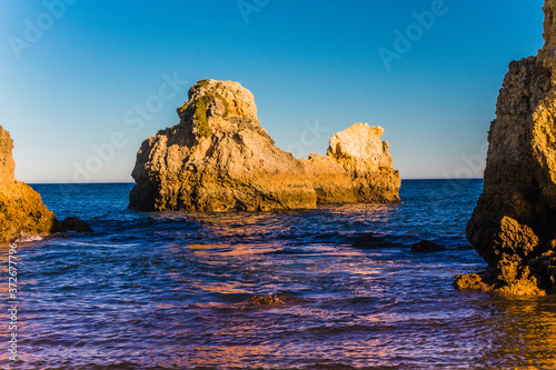 Beautiful hidden beach with beautiful blue water (Arrifes in Algarve, Portugal)